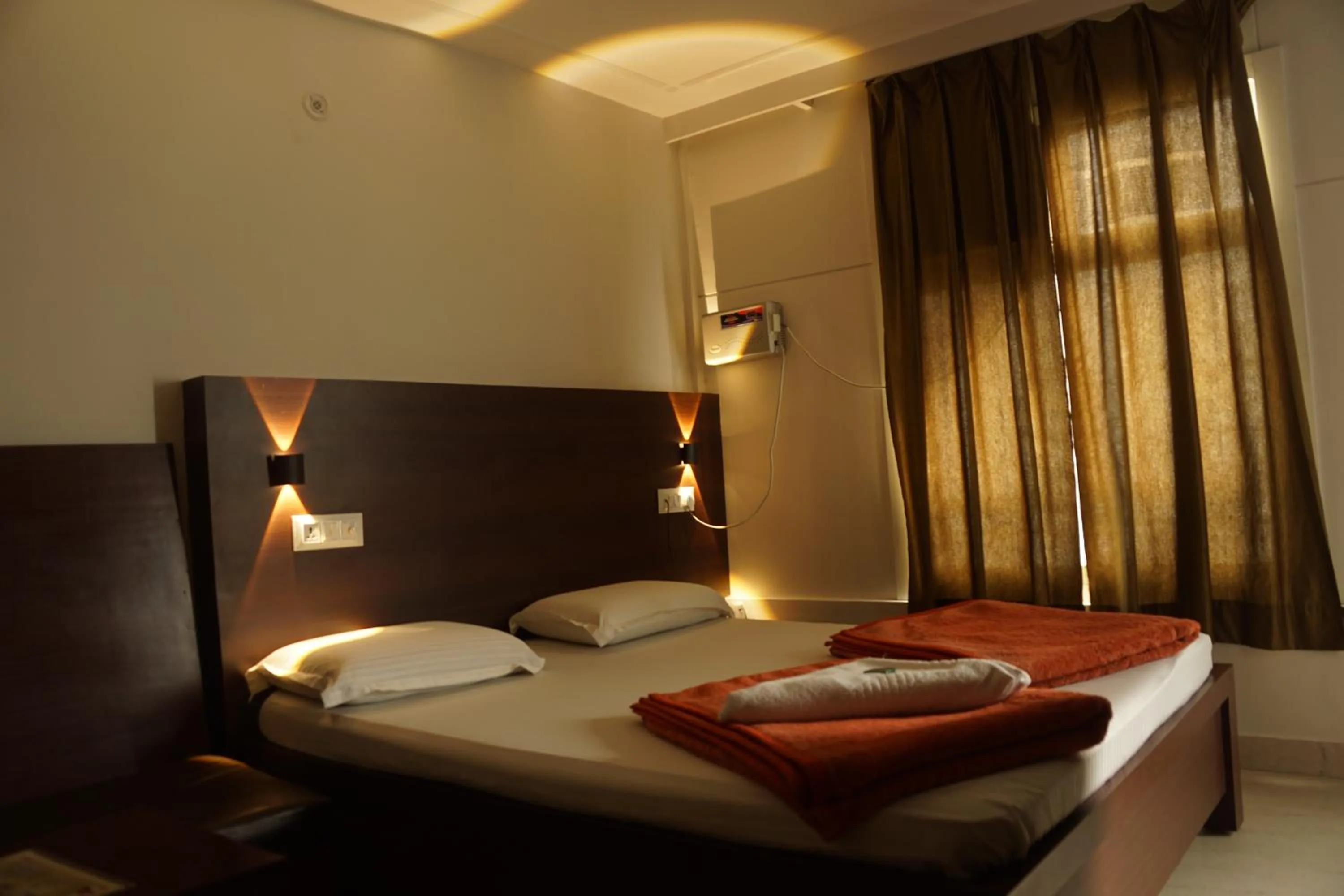 Bed in Subhash Hotel