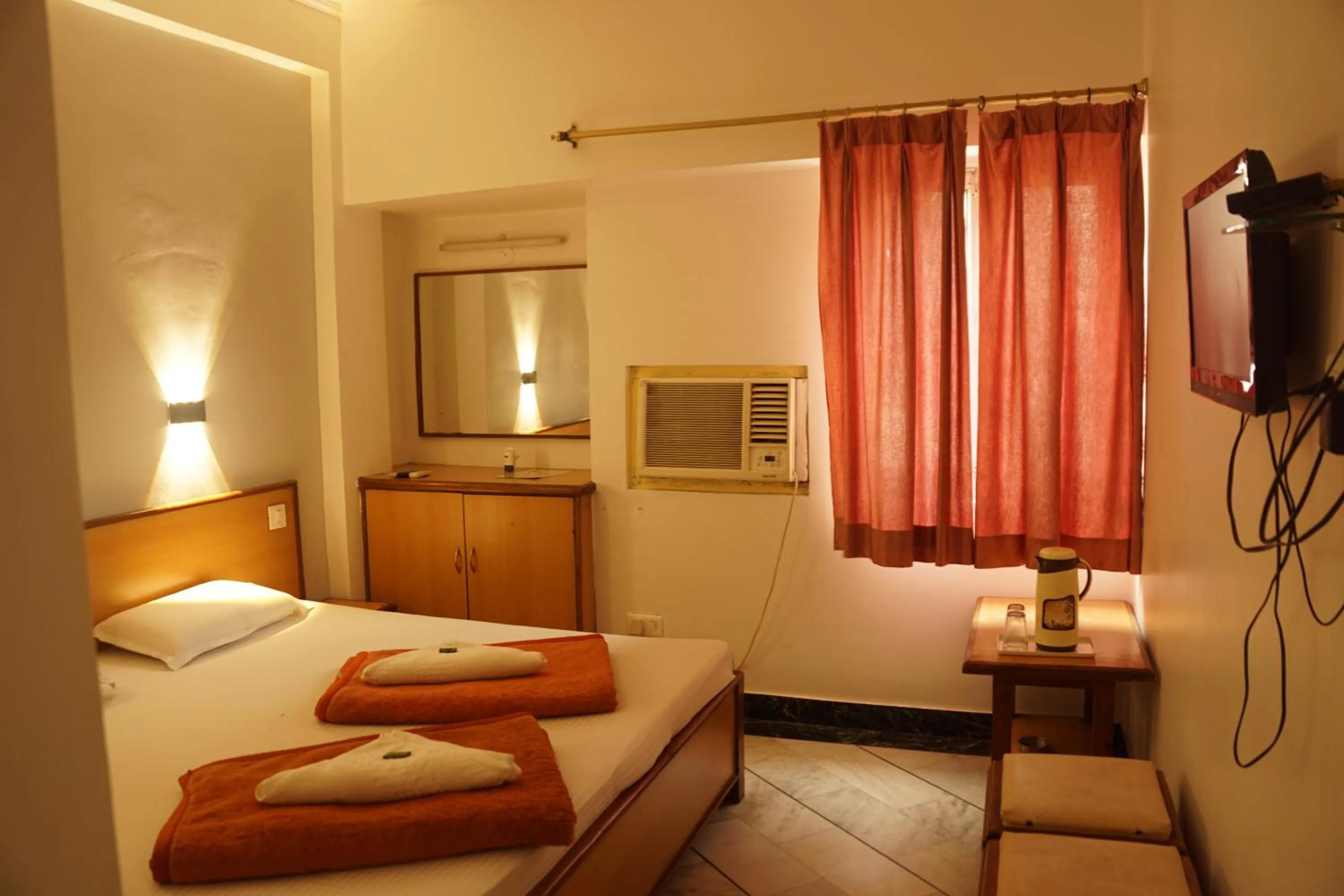 Bed in Subhash Hotel