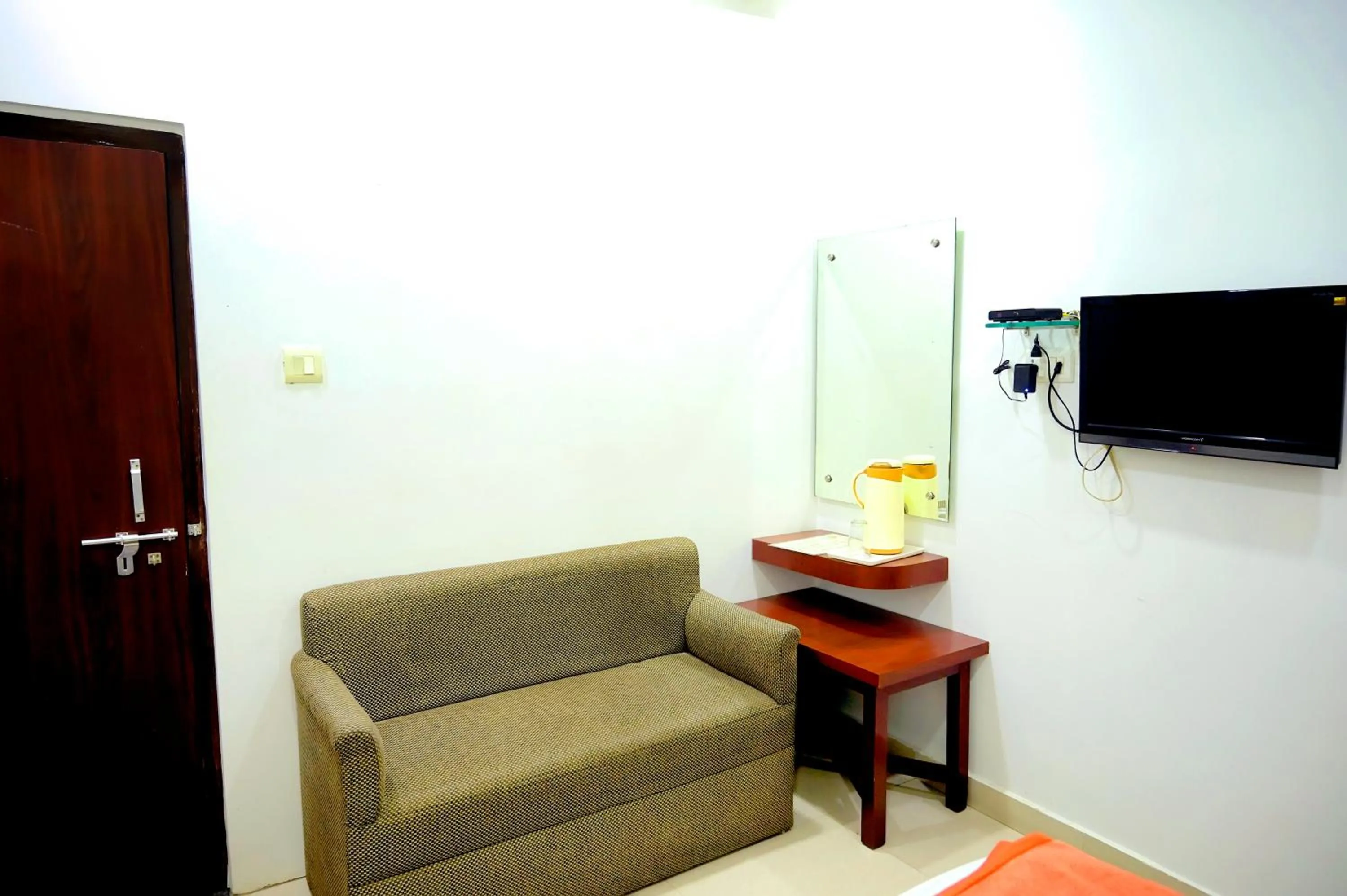 Seating area in Subhash Hotel