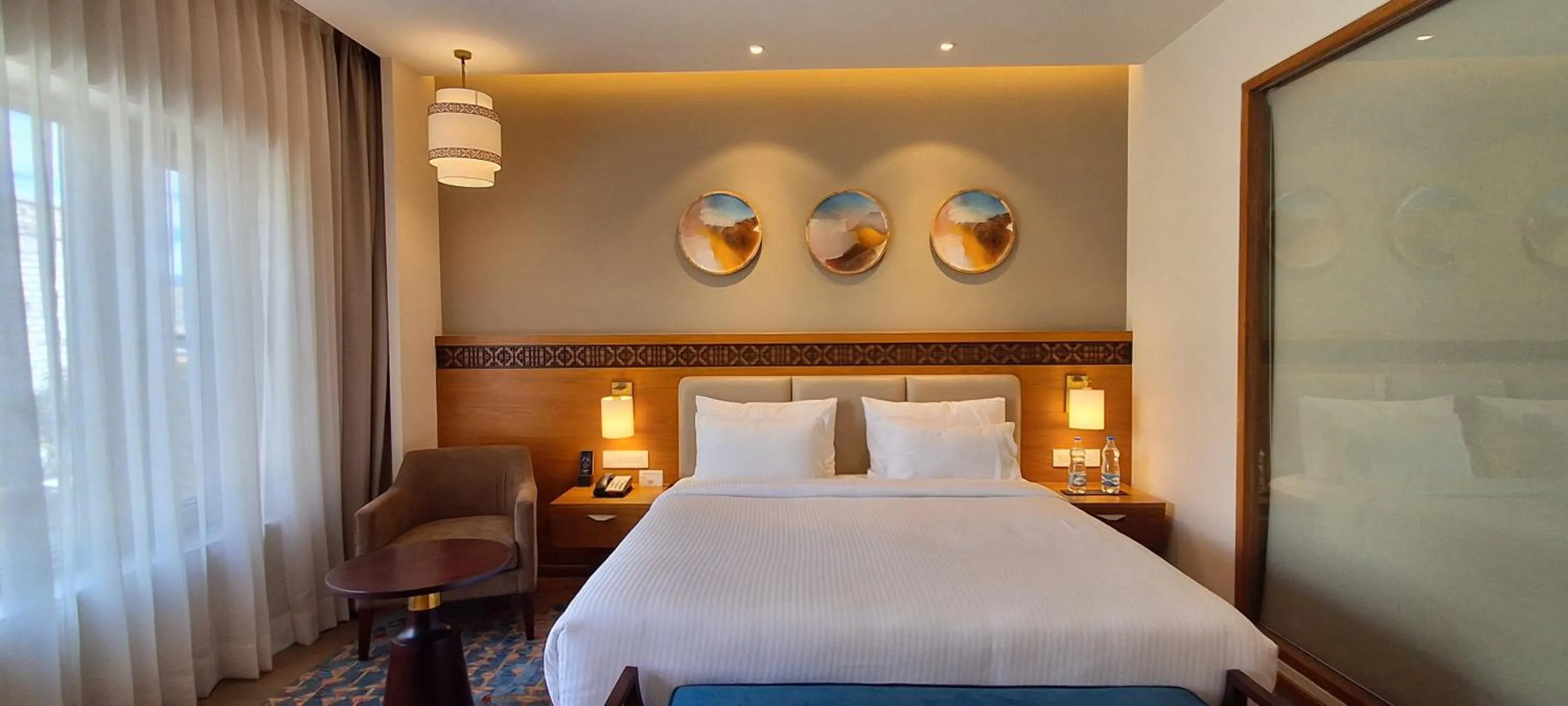 Bed in Charmwood Hotel