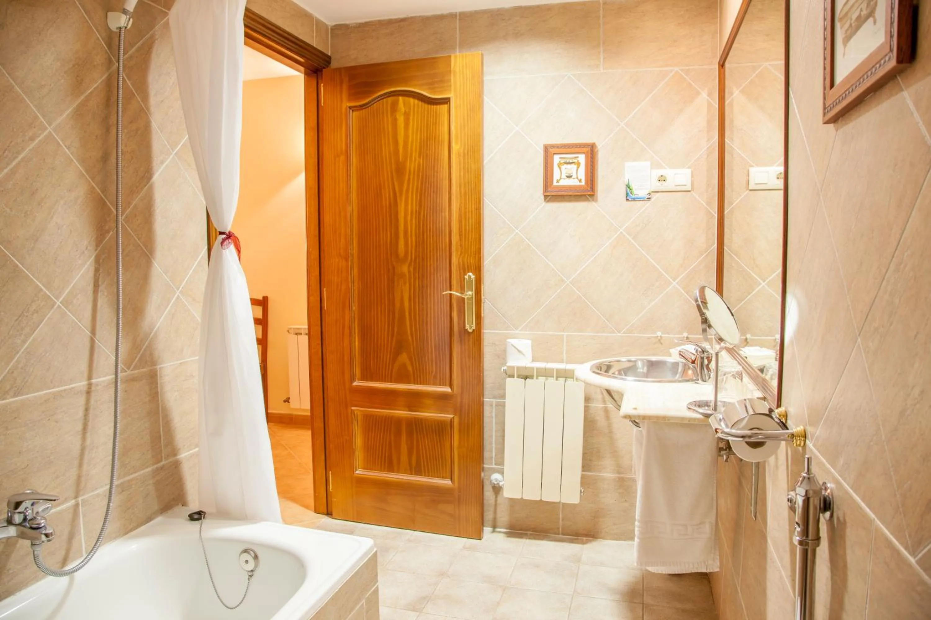 Bathroom in Hotel Mayno