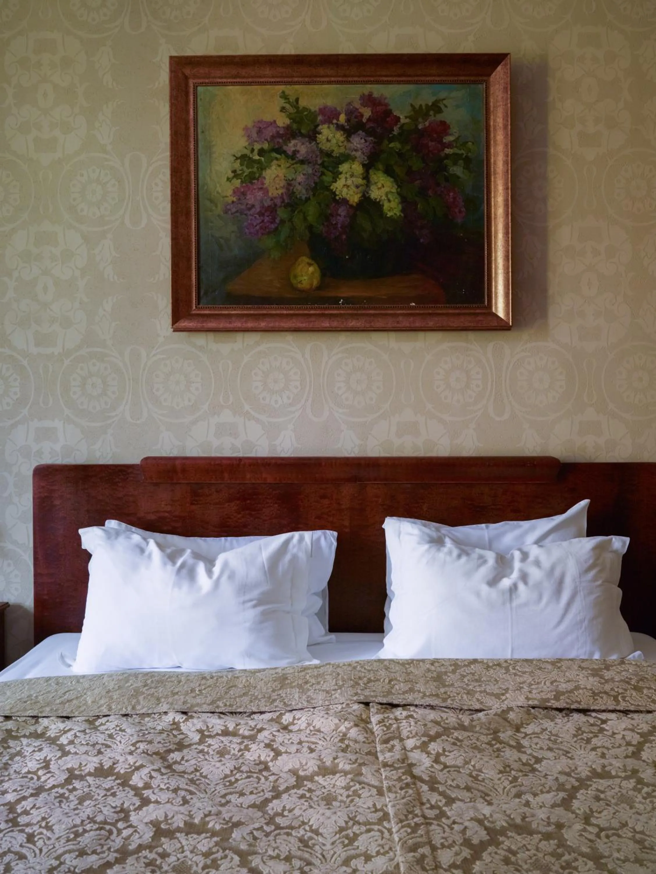 Bed in Vinotel Boutique Hotel