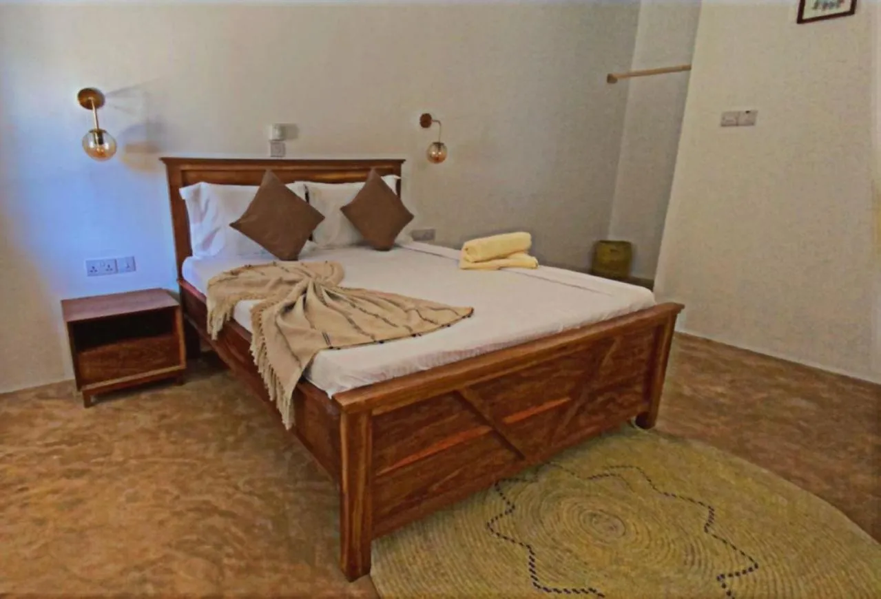 Bed in Coco Beach Hotel