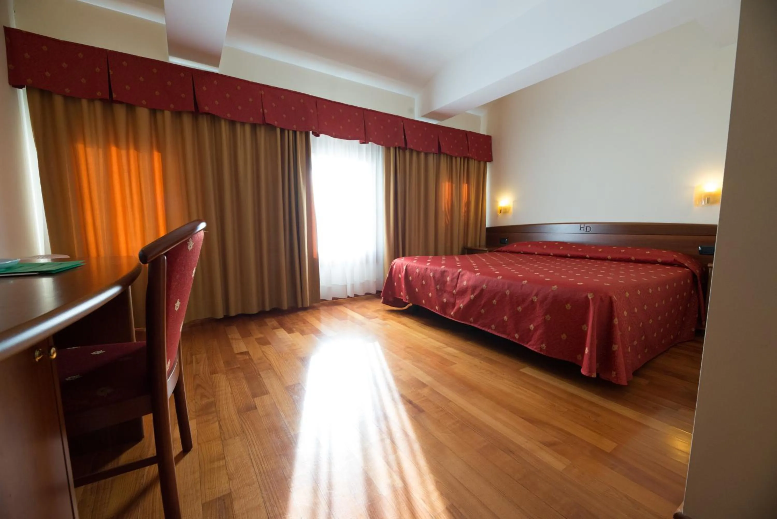 Bed in Hotel Dall'Ongaro