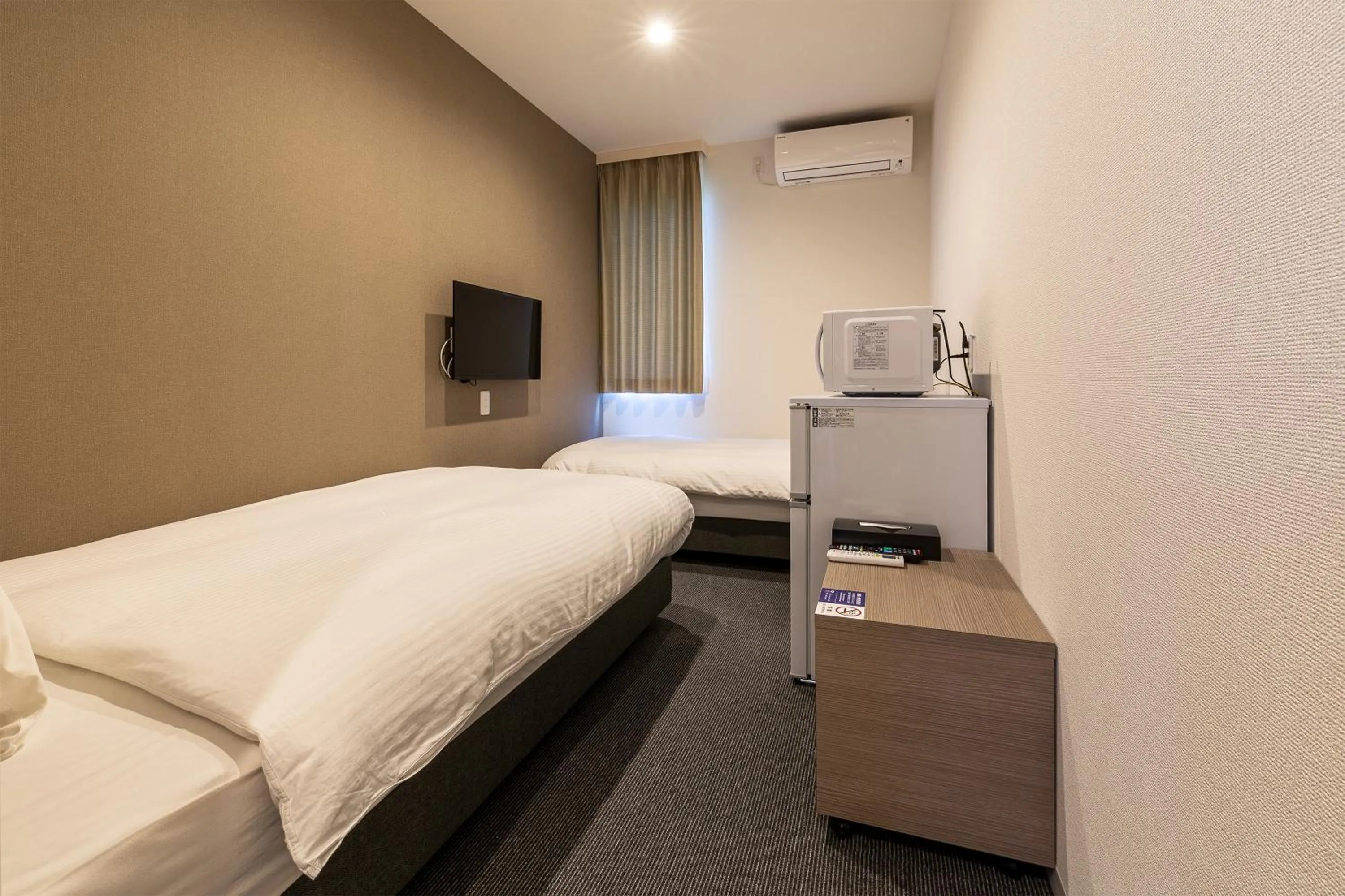 Photo of the whole room, Bed in HOTEL R9 The Yard Marugame