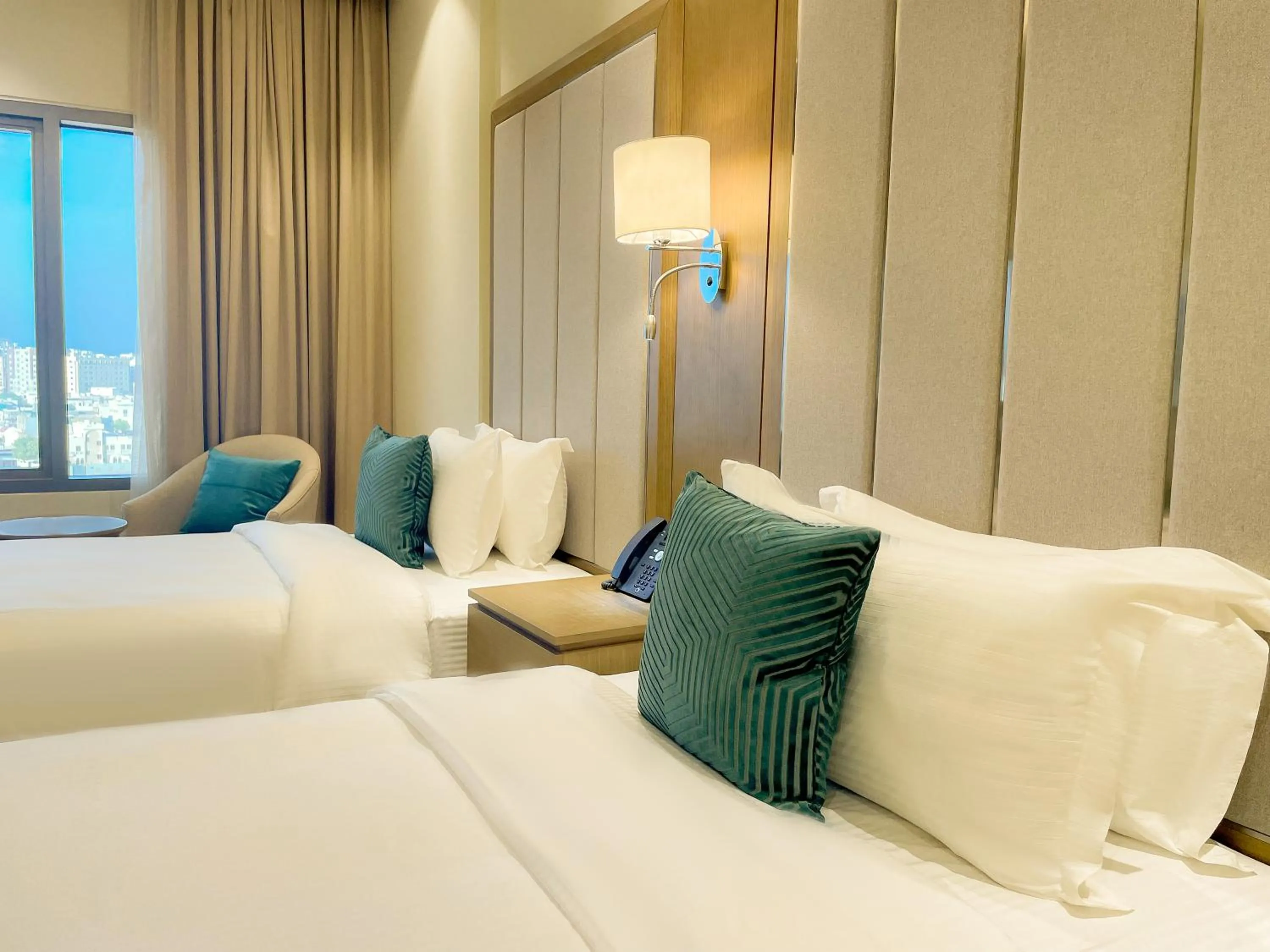 Bed in Mercure Muscat