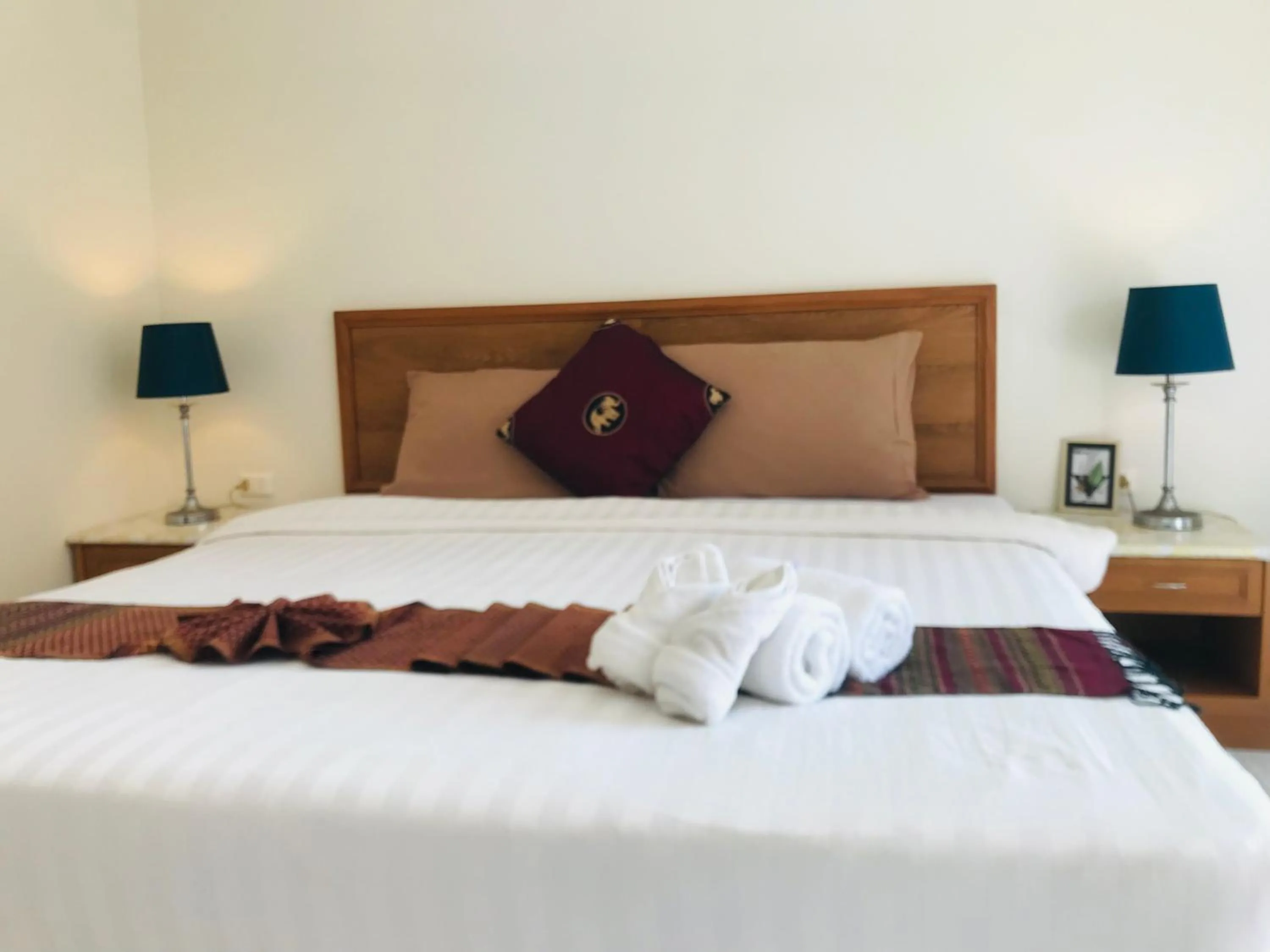 Bed in Global Hotel Beach View