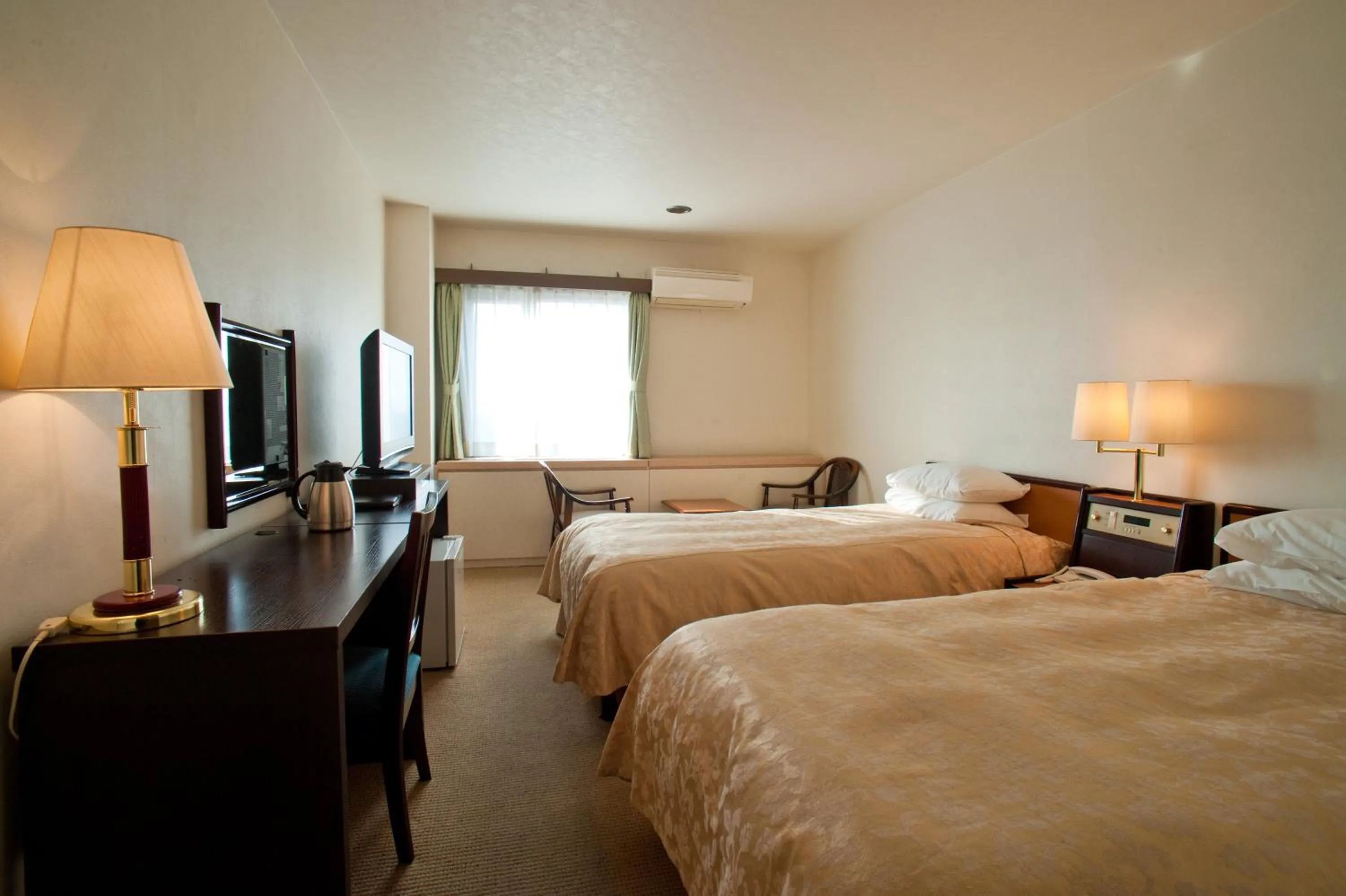 Photo of the whole room, Bed in Okazaki New Grand Hotel