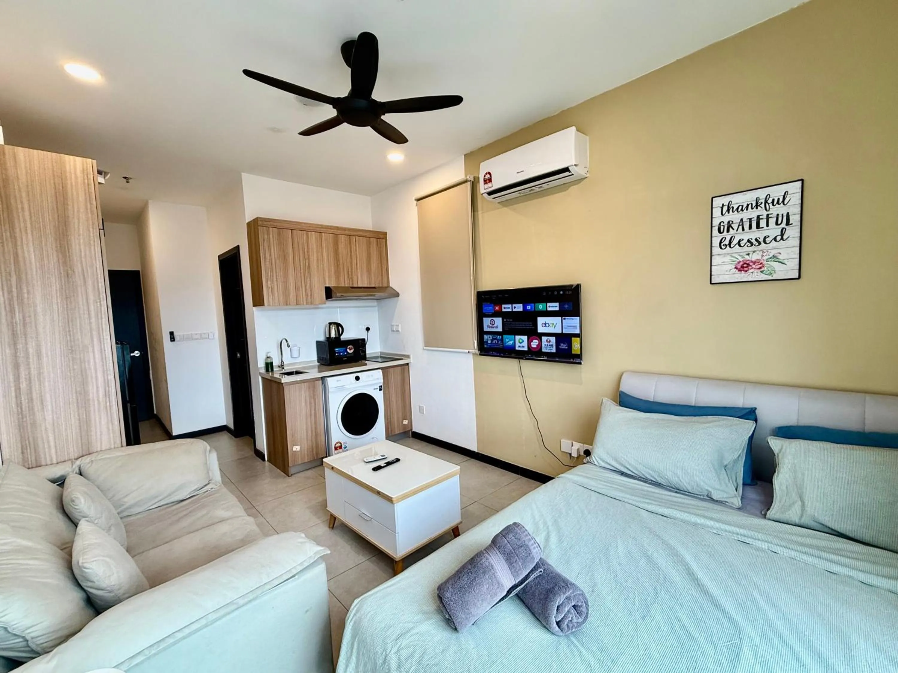 Bed in Neu Suites Service Apartment By Moonlight