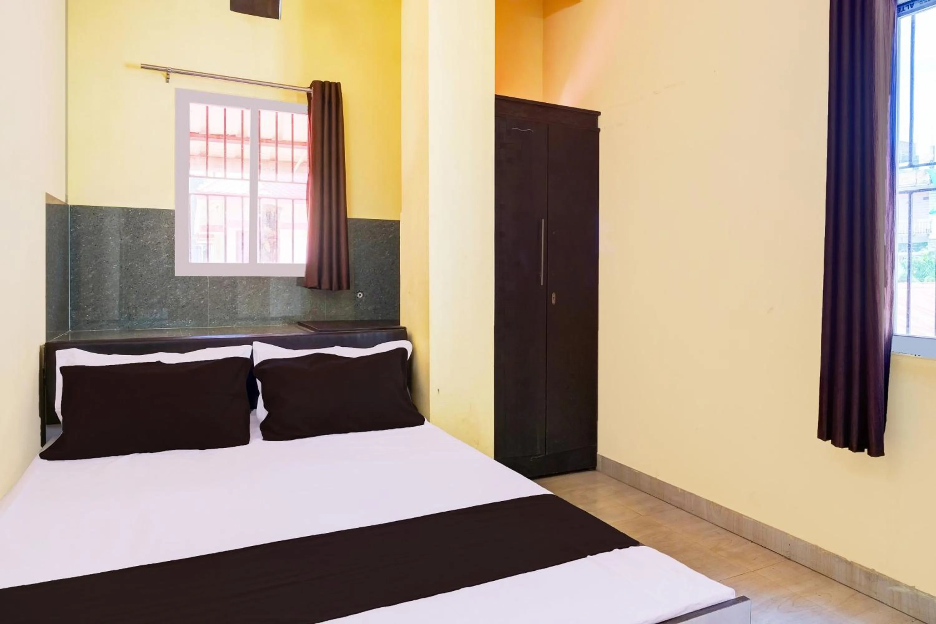 Bedroom in Super Hotel O Modern Home