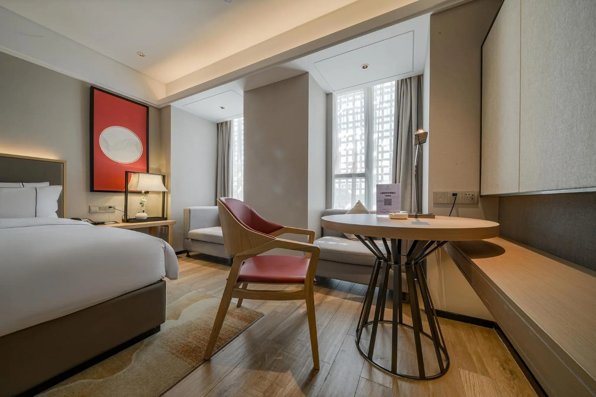 Photo of the whole room, Bed in ECHENG Hotel, Nanning Wanda Plaza Convention and Exhibition Center