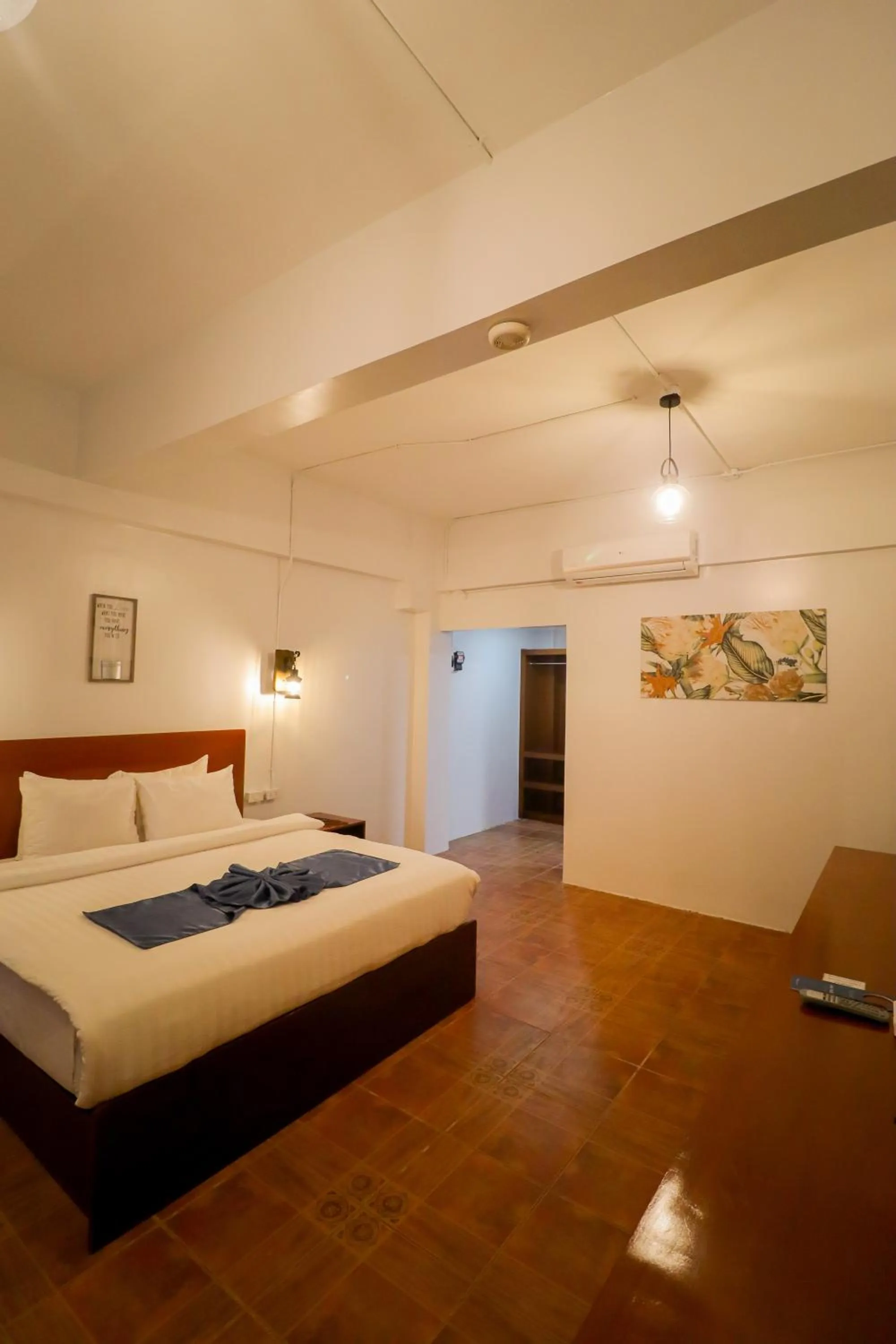 Bed in Bolabog Beach Resort