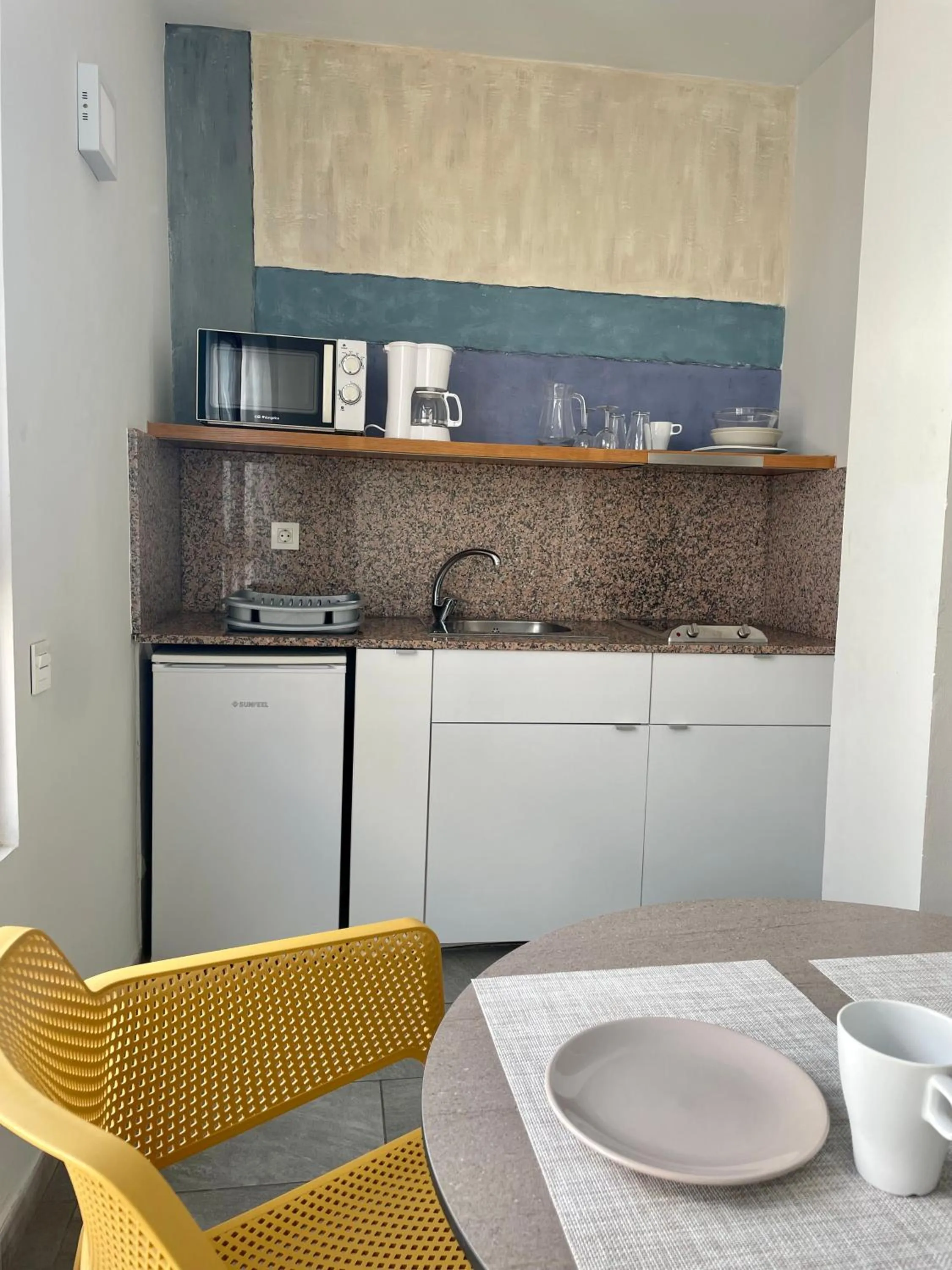 Kitchen or kitchenette in ApartHotel Idafe