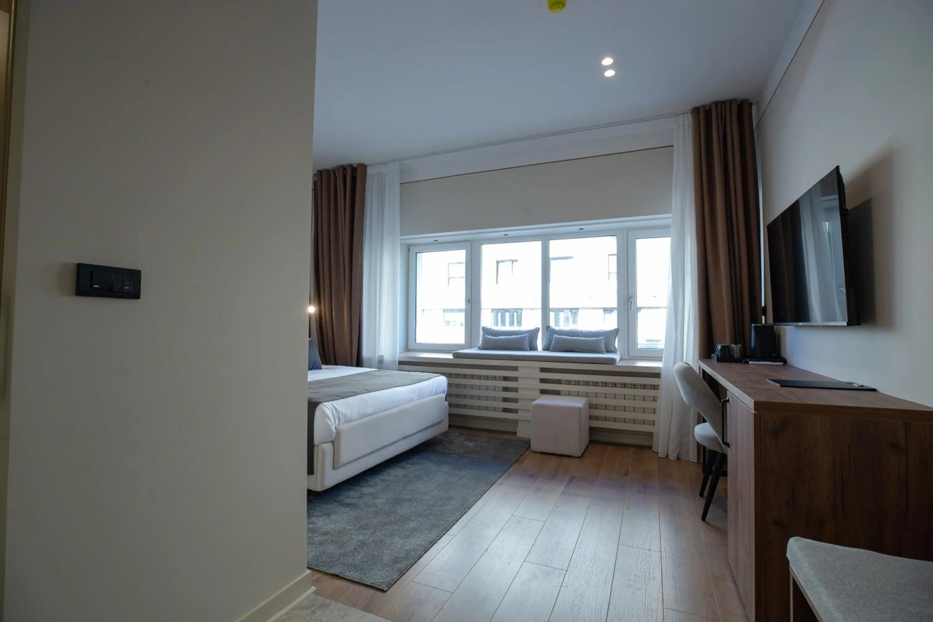 Bed in Simma Luxury Apartments & Rooms