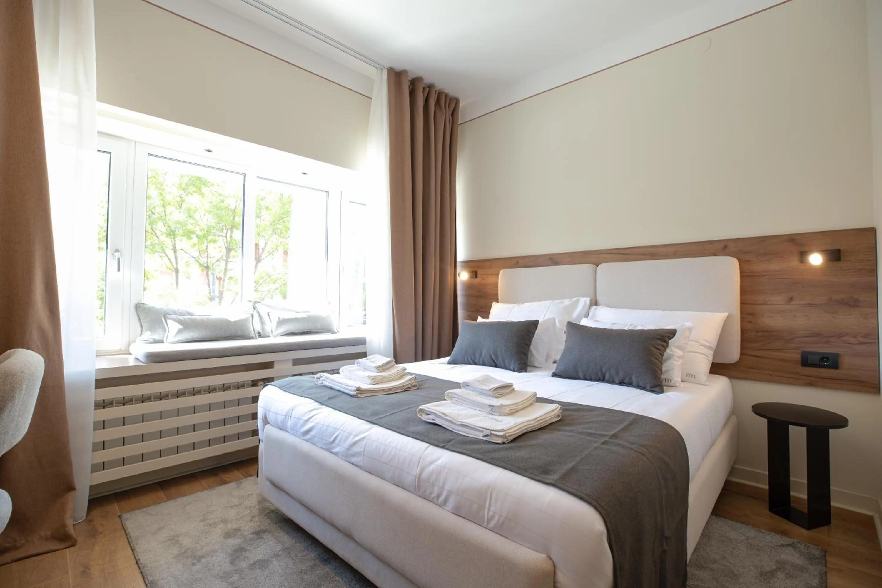 Bed in Simma Luxury Apartments & Rooms