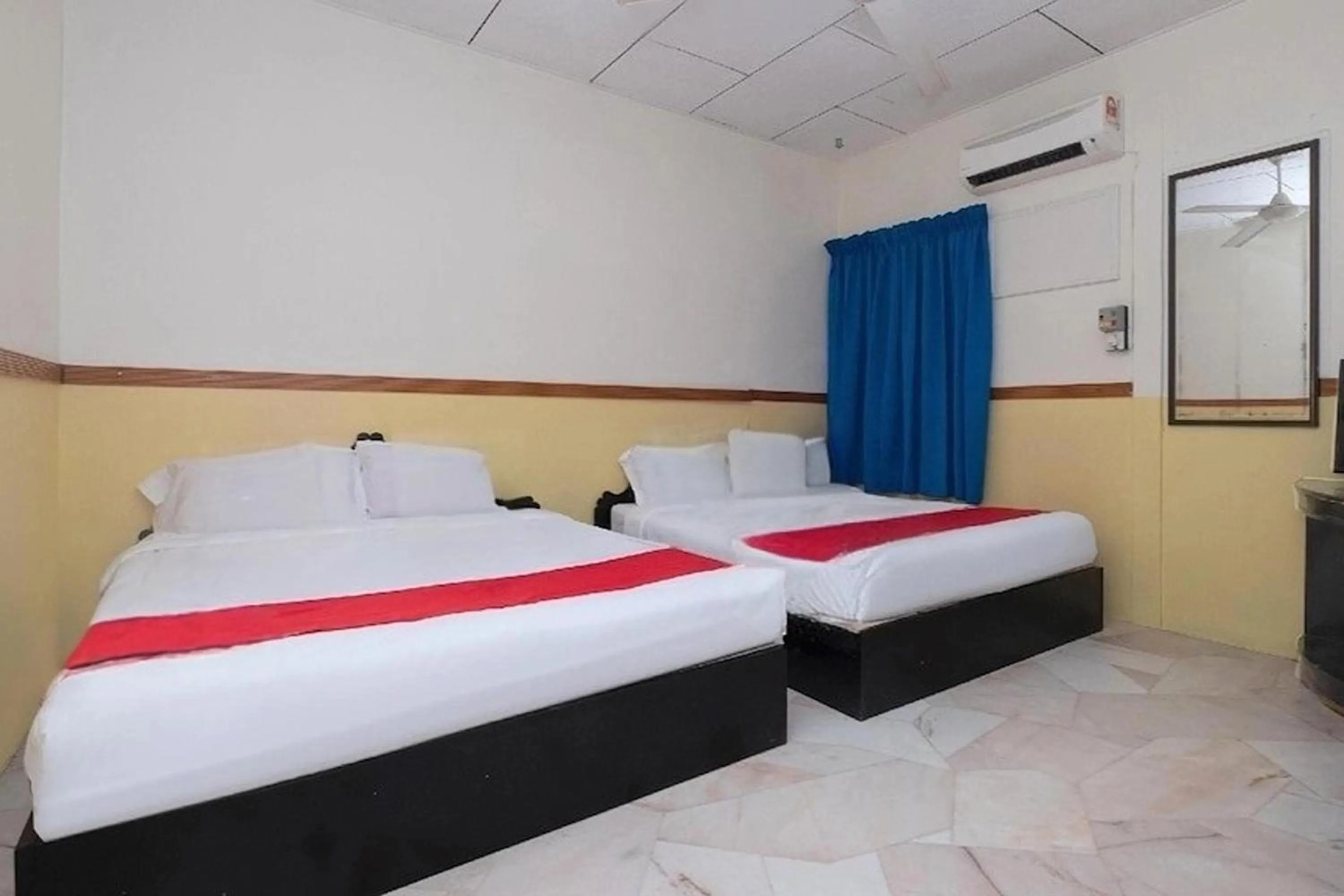 Bed in Lumut Villa Inn
