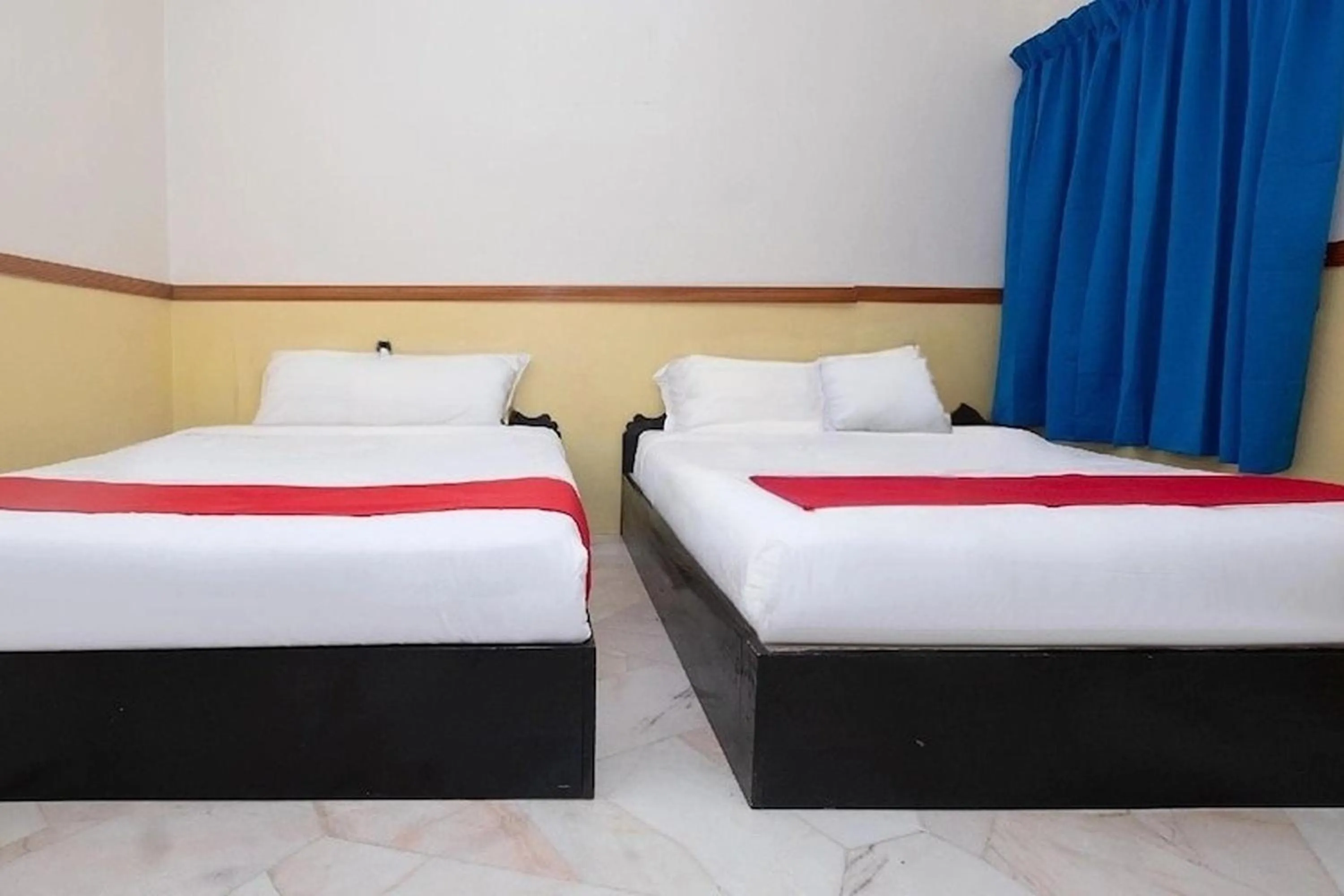 Bed in Lumut Villa Inn