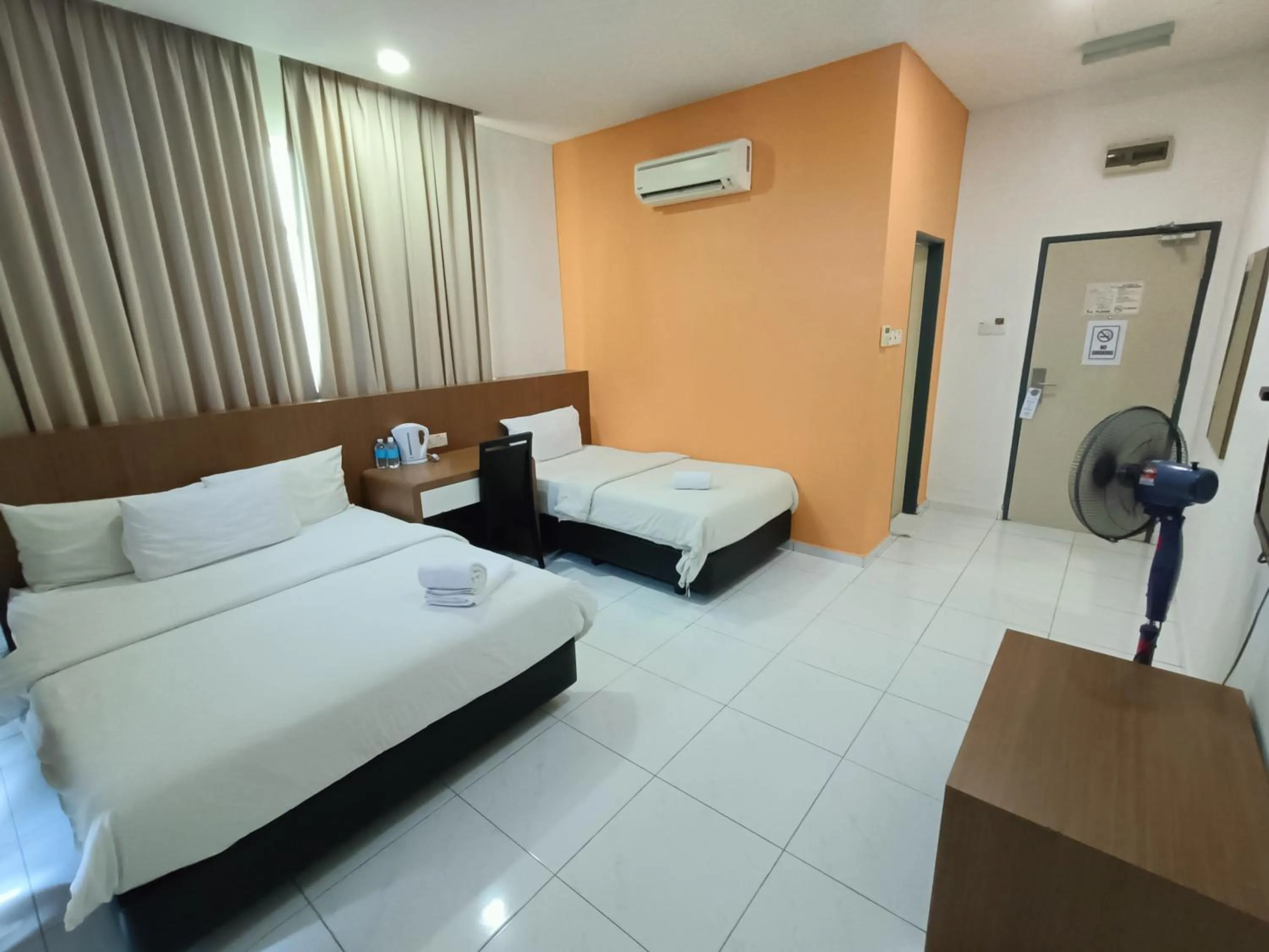 Bed in Hotel Wawasan