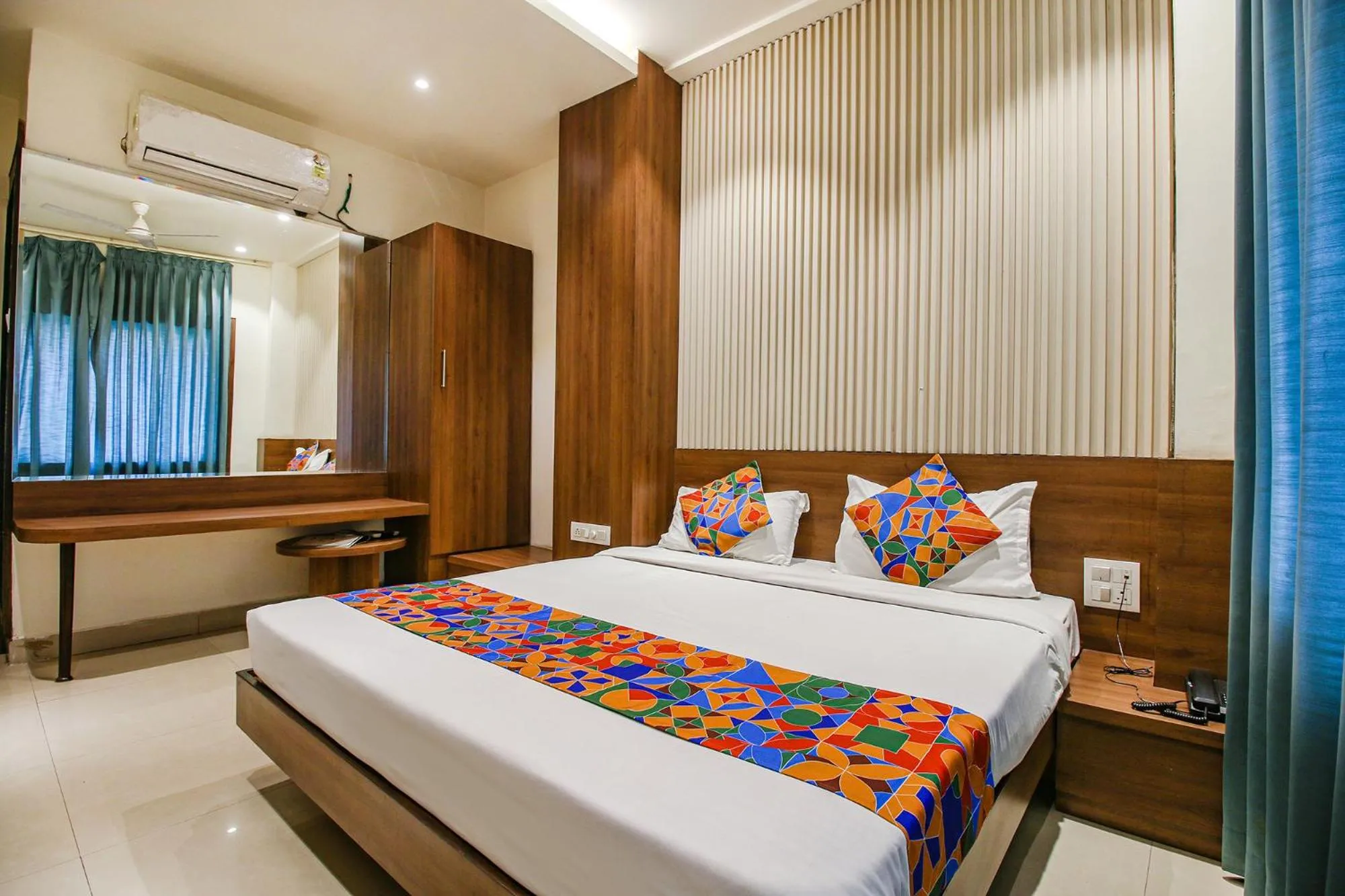 Bed in FabHotel Royal Palace II