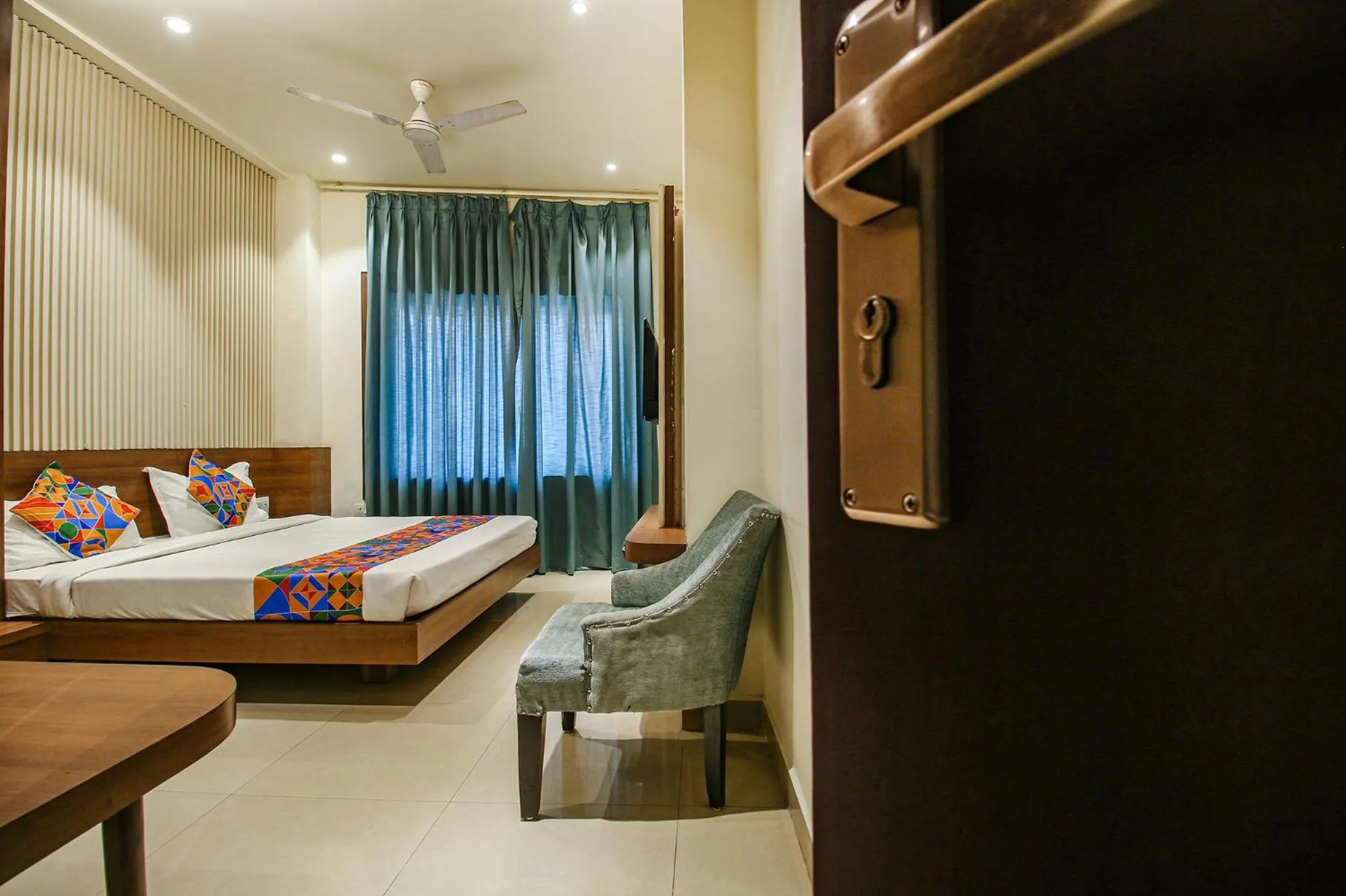 Bed in FabHotel Royal Palace II