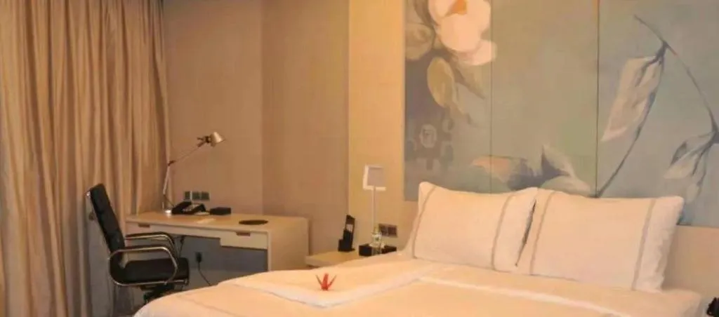 Bed in Grand Skylight International Hotel Gongqingcheng