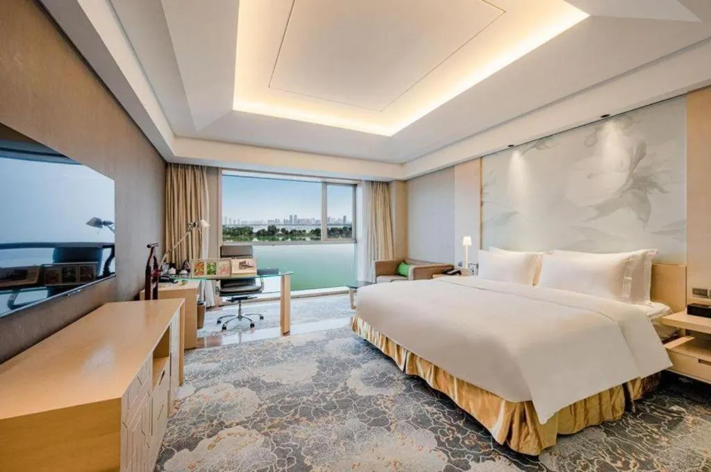 Bed in Grand Skylight International Hotel Gongqingcheng