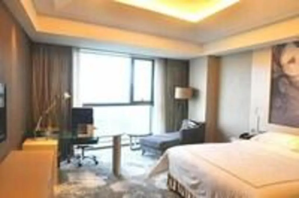 Bed in Grand Skylight International Hotel Gongqingcheng