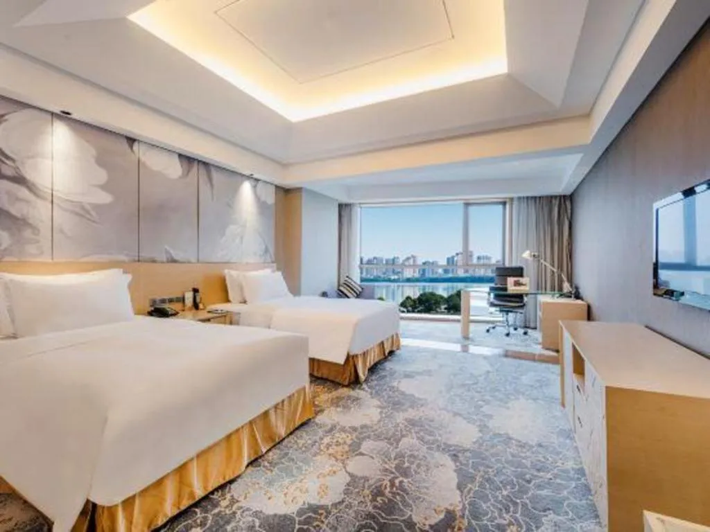 Bed in Grand Skylight International Hotel Gongqingcheng
