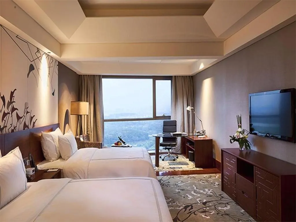 Bed in Grand Skylight International Hotel Gongqingcheng