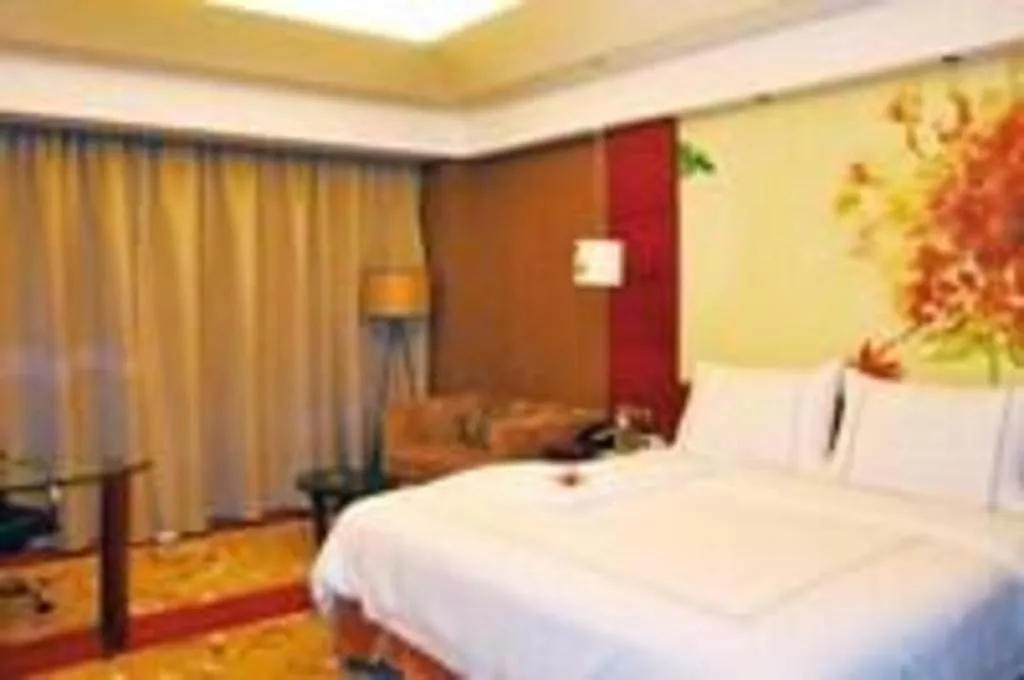 Bed in Grand Skylight International Hotel Gongqingcheng