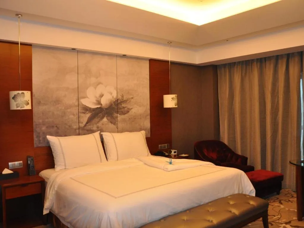 Bed in Grand Skylight International Hotel Gongqingcheng