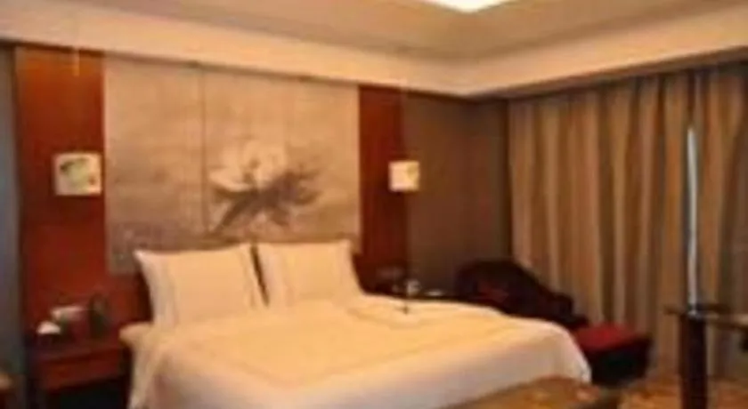 Bed in Grand Skylight International Hotel Gongqingcheng