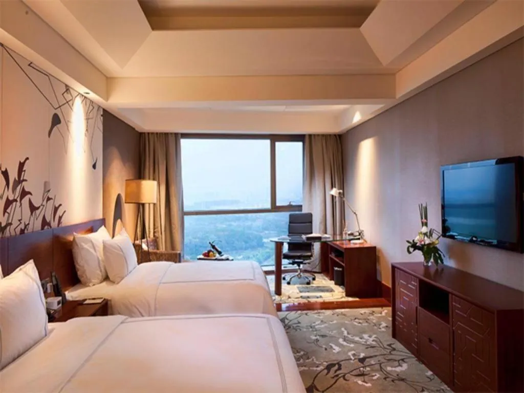 Bed in Grand Skylight International Hotel Gongqingcheng