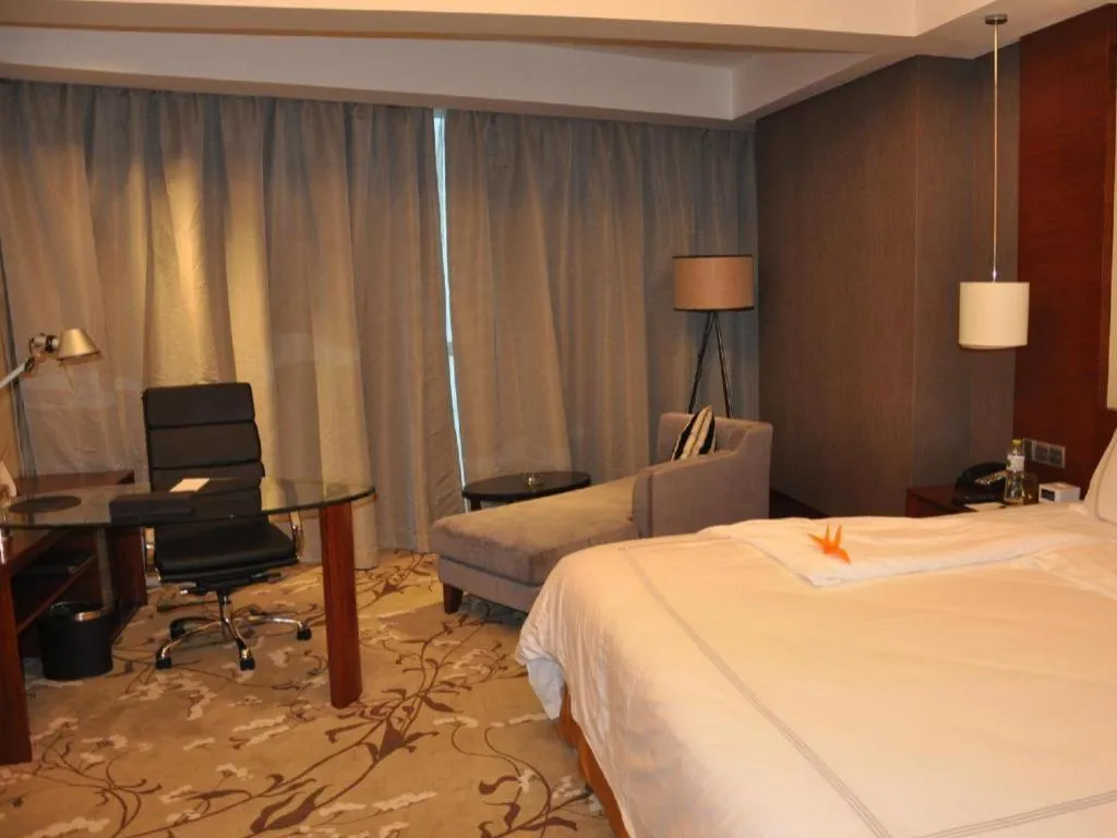 Bed in Grand Skylight International Hotel Gongqingcheng