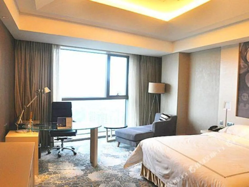 Bed in Grand Skylight International Hotel Gongqingcheng