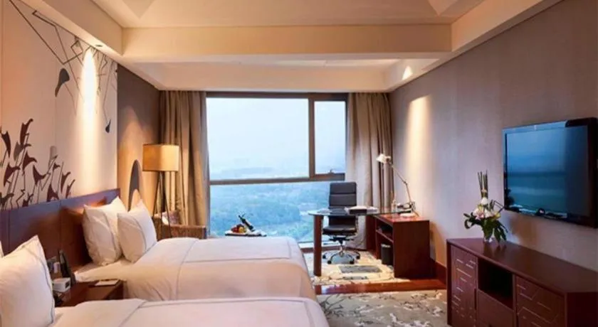 Bed in Grand Skylight International Hotel Gongqingcheng