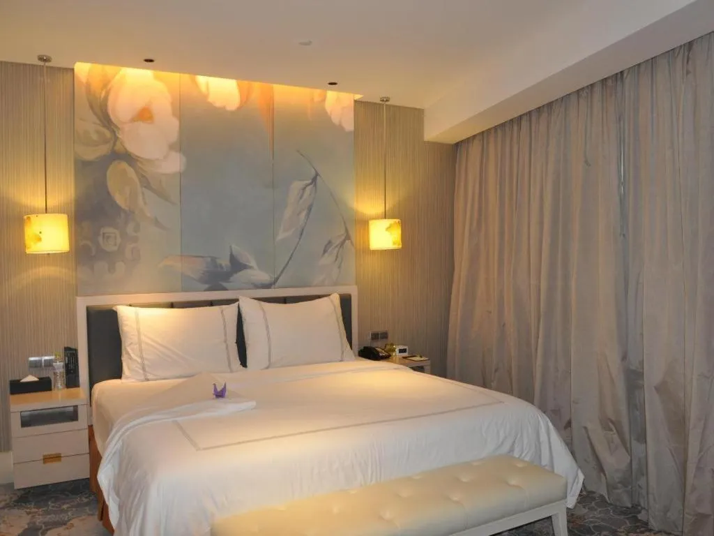 Bed in Grand Skylight International Hotel Gongqingcheng