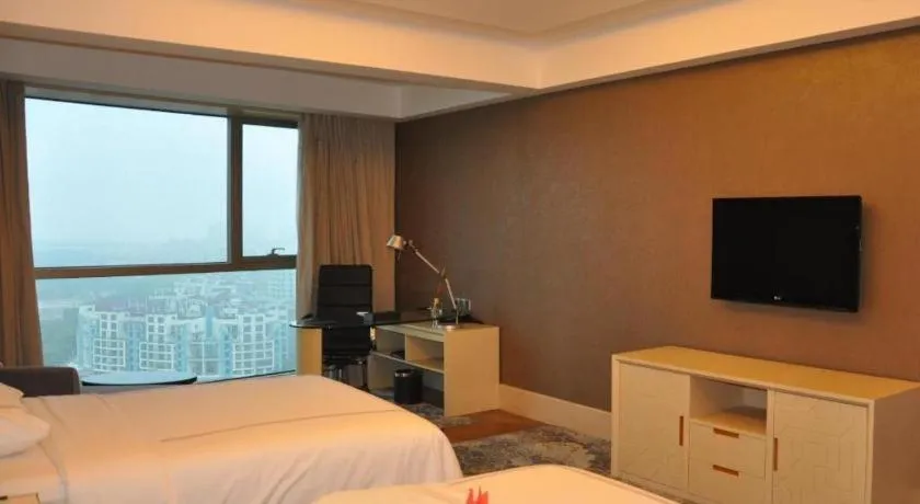 Bed in Grand Skylight International Hotel Gongqingcheng