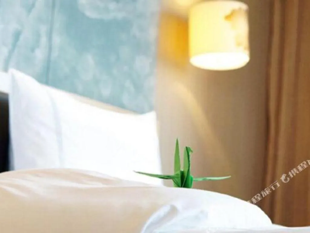 Bed in Grand Skylight International Hotel Gongqingcheng