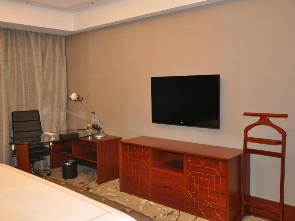 Bed in Grand Skylight International Hotel Gongqingcheng