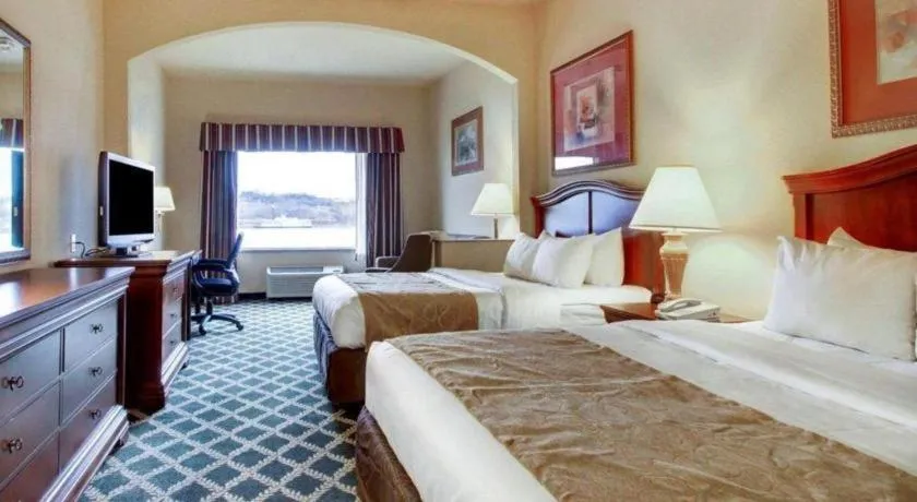 Bed in Clarion Suites Vidalia Riverfront