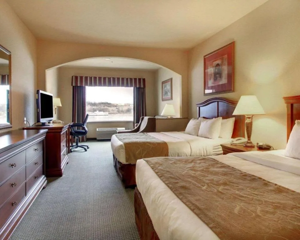 Bed in Clarion Suites Vidalia Riverfront