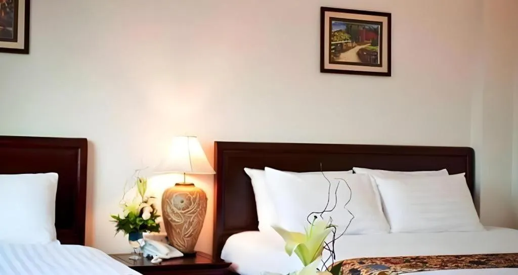 Bed in Lao Golden Hotel