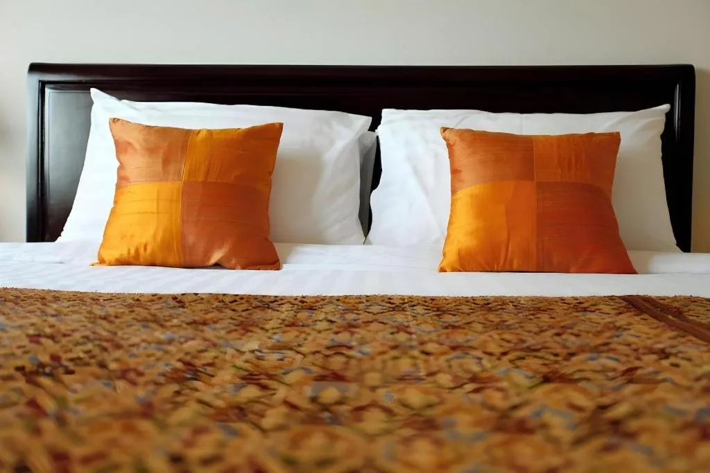 Bed in Lao Golden Hotel