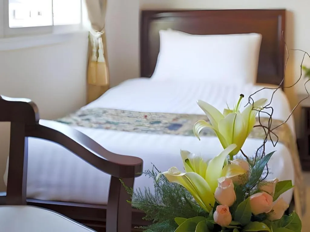 Bed in Lao Golden Hotel