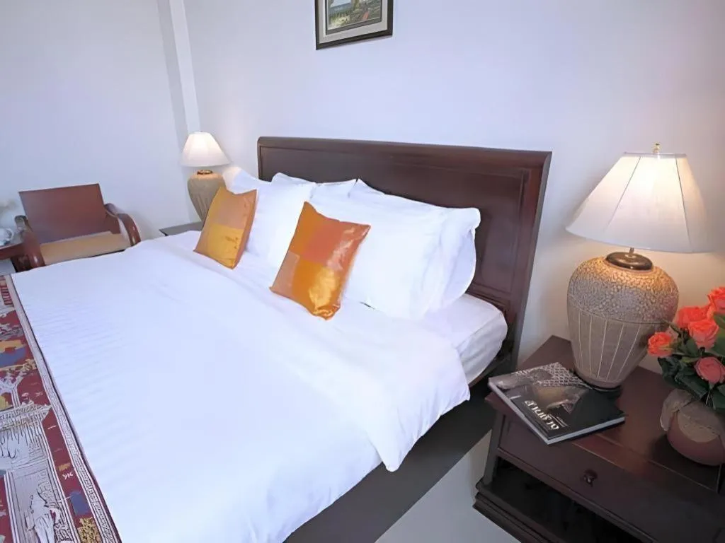 Bed in Lao Golden Hotel