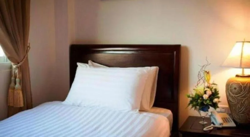 Bed in Lao Golden Hotel