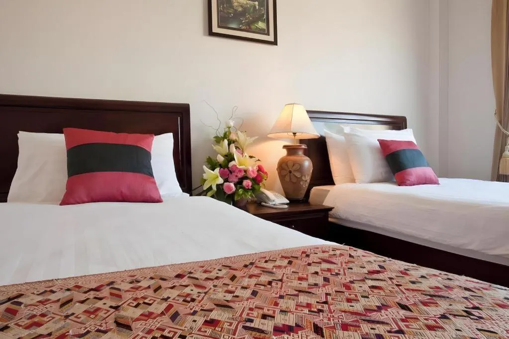 Bed in Lao Golden Hotel