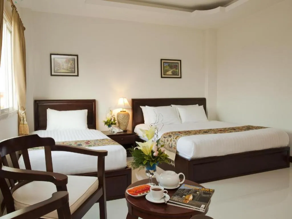 Bed in Lao Golden Hotel