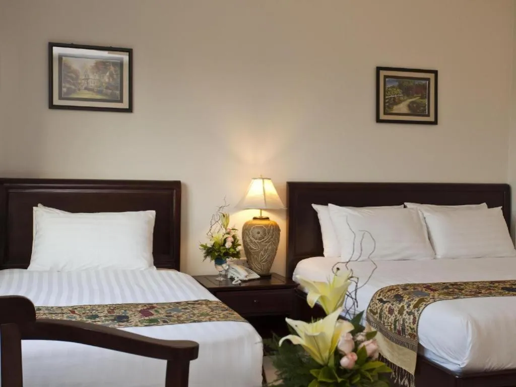 Bed in Lao Golden Hotel